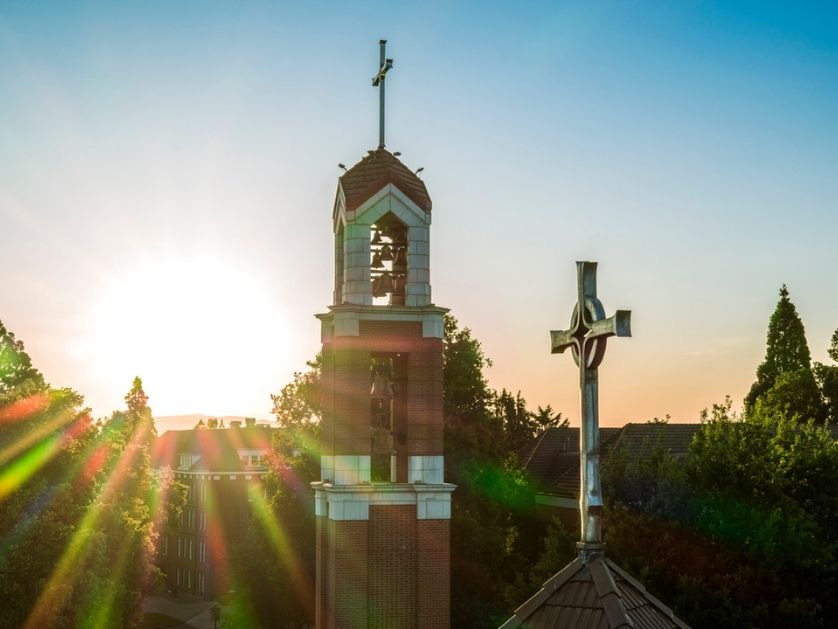 An aerial image of the bell tower at sunrise