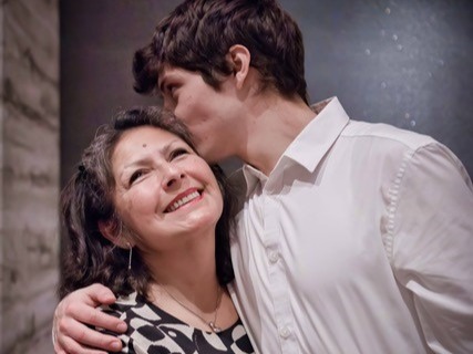 Senior Soiree son hugging mom