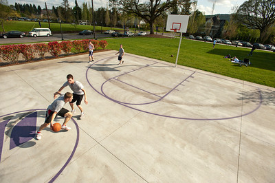 students playing basketball