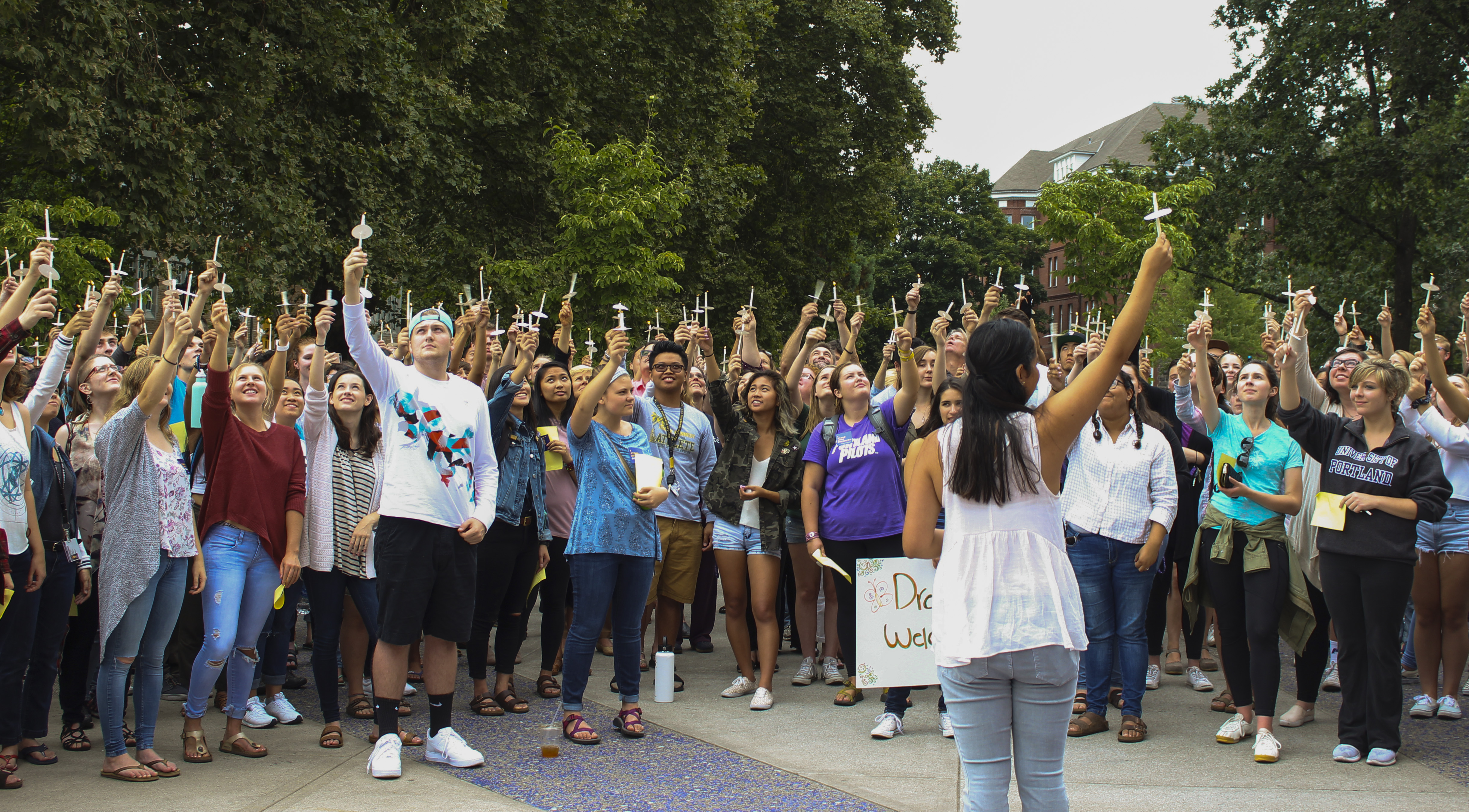 students gathered for a DACA candlelit vigil