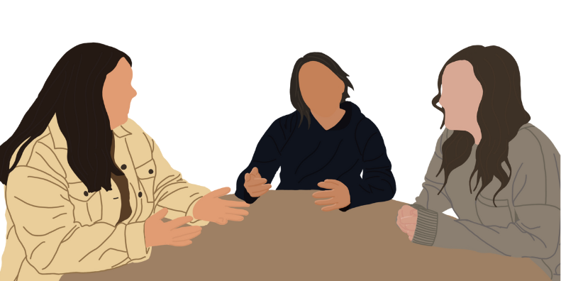 Students talking at a table