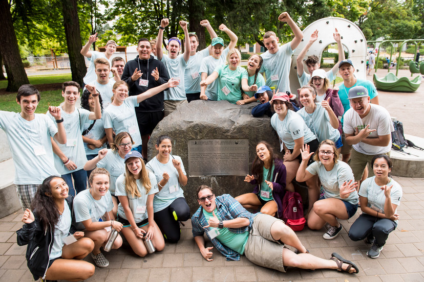 Students gathered in a community garden