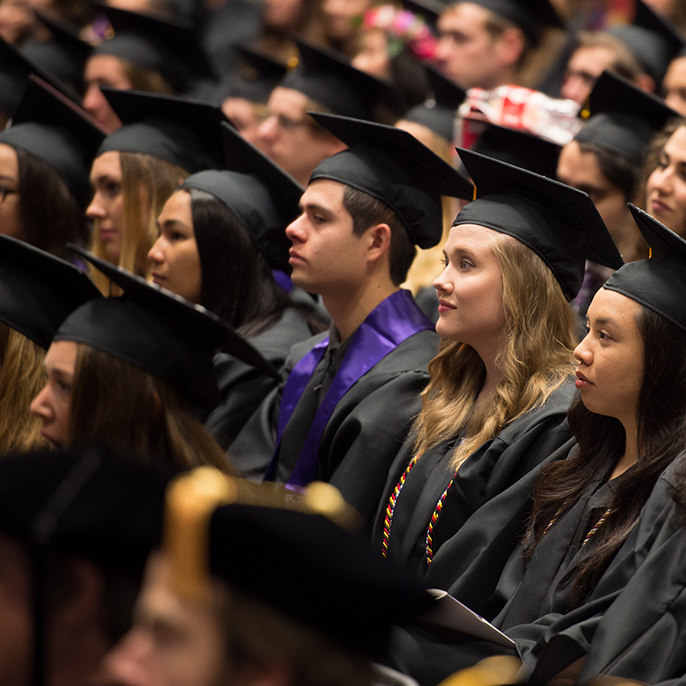 photo of UP students in cap and gown