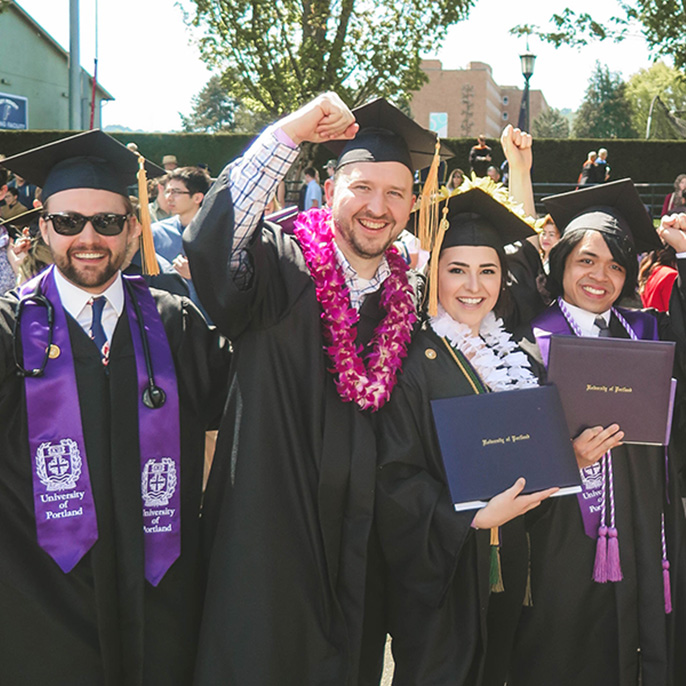 student smiling at commencement