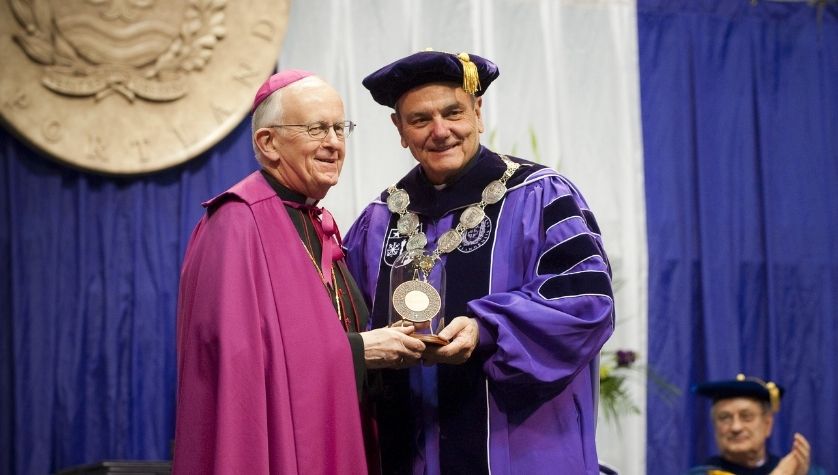 Vlazny being awarded the Christus Magister medal at a graduation ceremony.