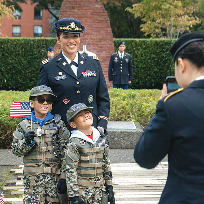 Major Maribel Ortega de Pacheco and her children