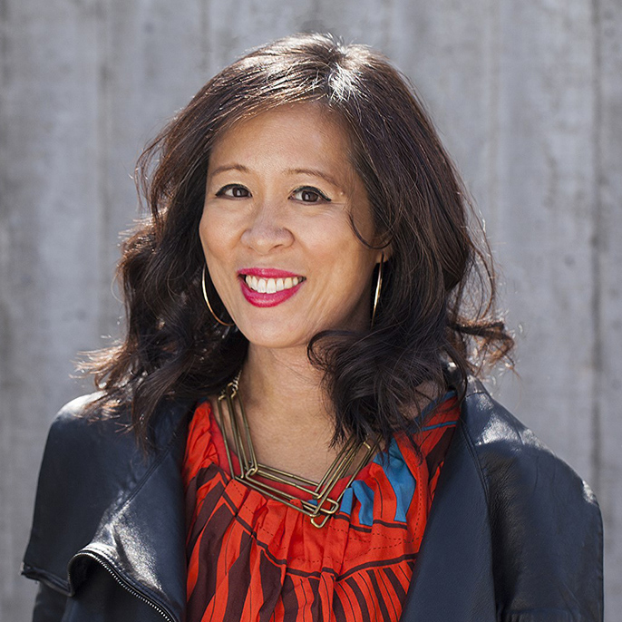 Lisa Ko in front of backdrop