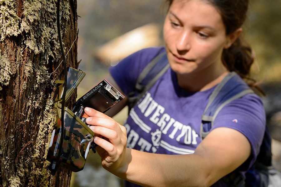 Student researcher with recording equipment