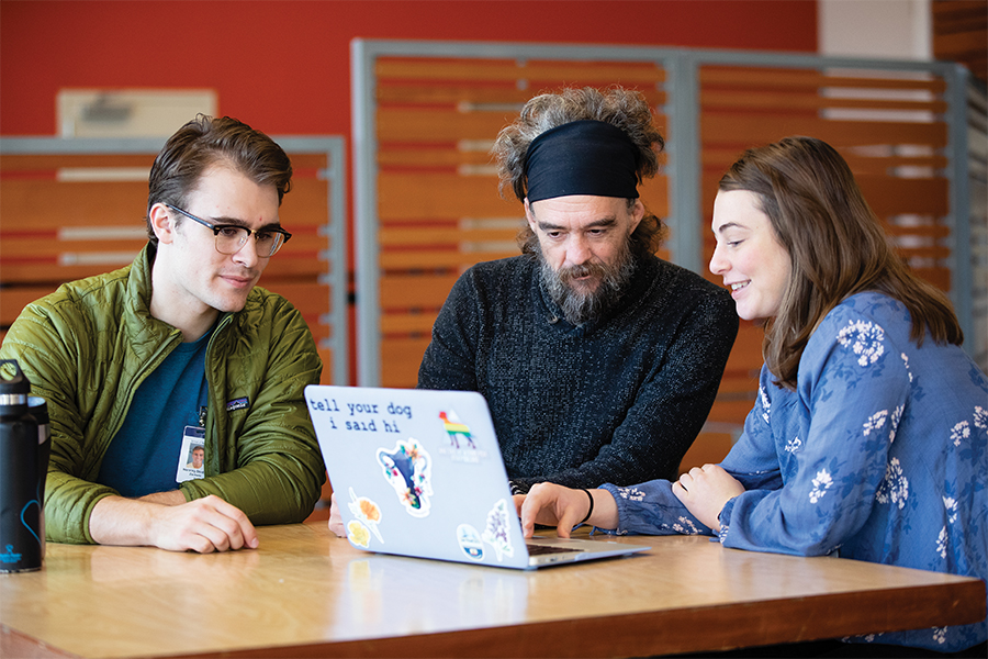 Nursing students and Blanchet guest with computer