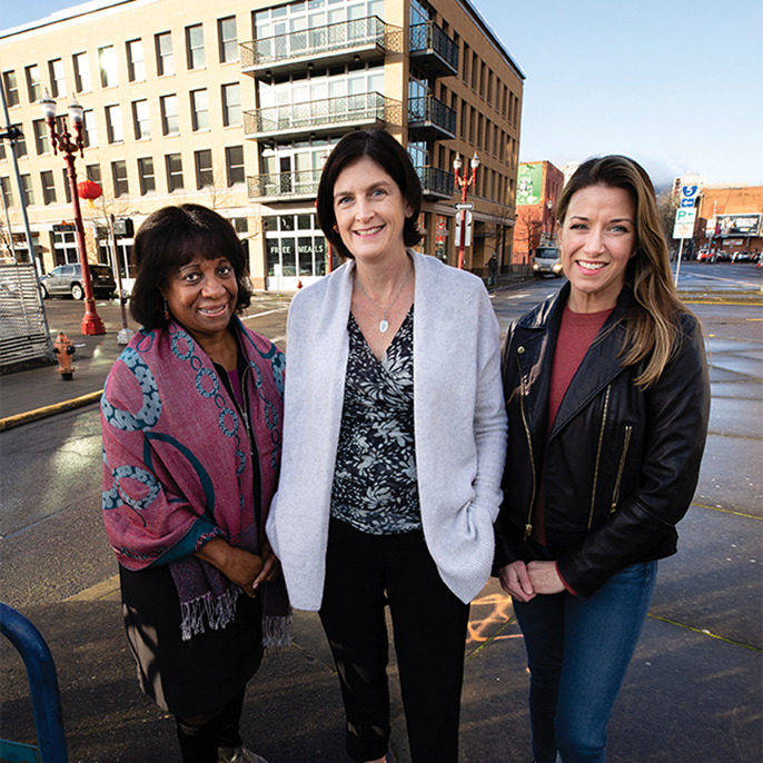 Kay Toran, Kelly Fox, and Emily Harrington outside the Blanchet House