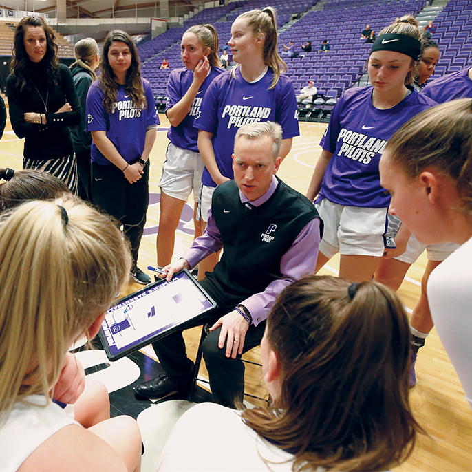 Michael Meek in timeout circle with players