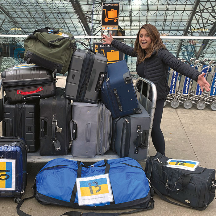  Alena Romanyuk at the airport with baggage