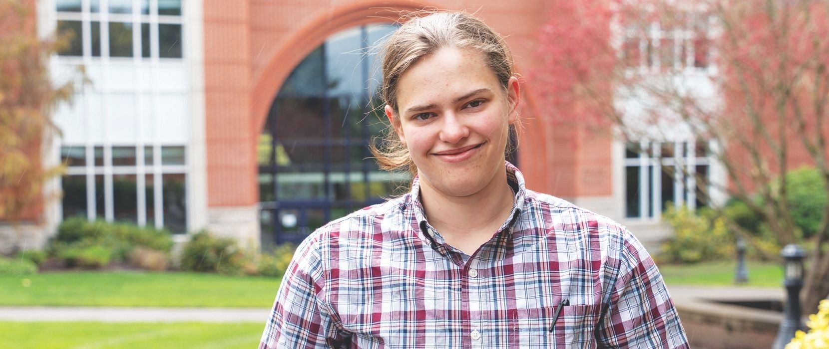 Anna Singley in front of Franz building