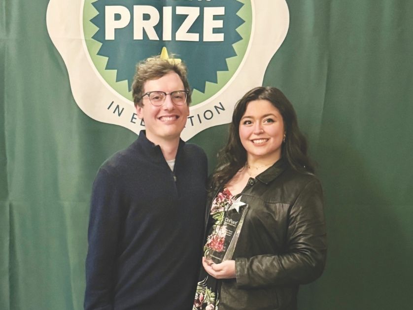 Sophia Aguirre holds her teaching award