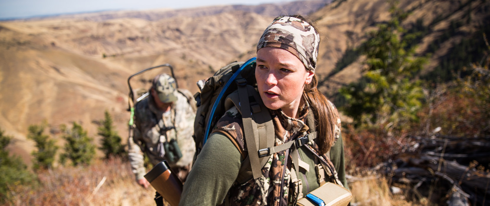 Chelsea Cassens in hunting gear in eastern Oregon