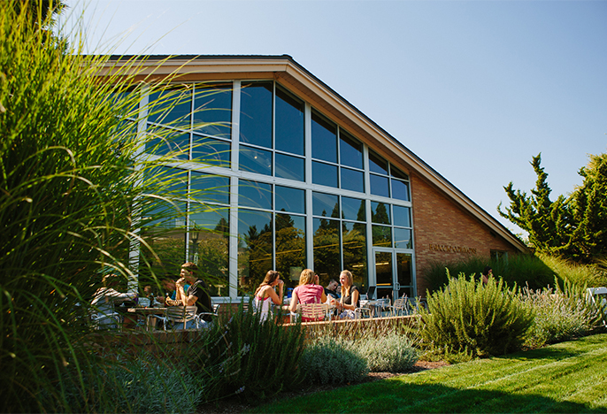 Front of Bauccio Commons with the patio tables filled.