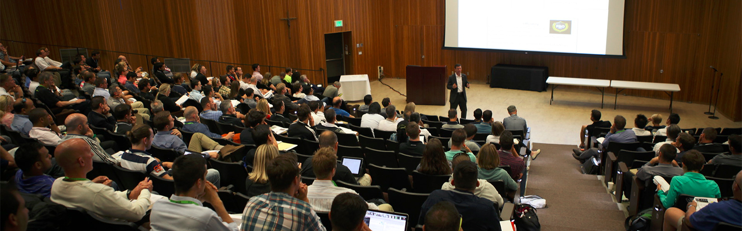 Male lecturing in Buckley Center Auditorium